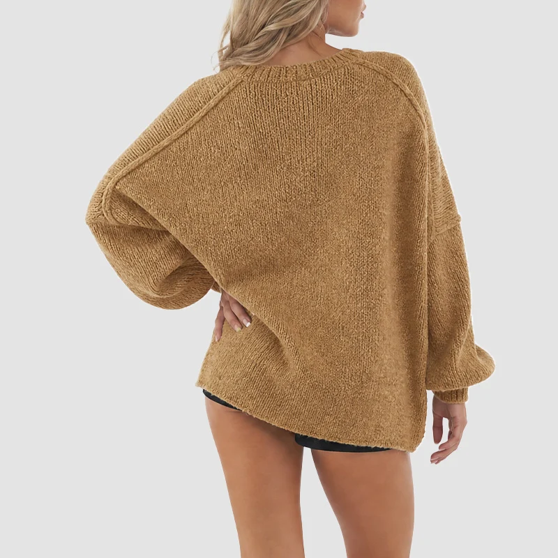 Back view of camel oversized cardigan showing relaxed drape