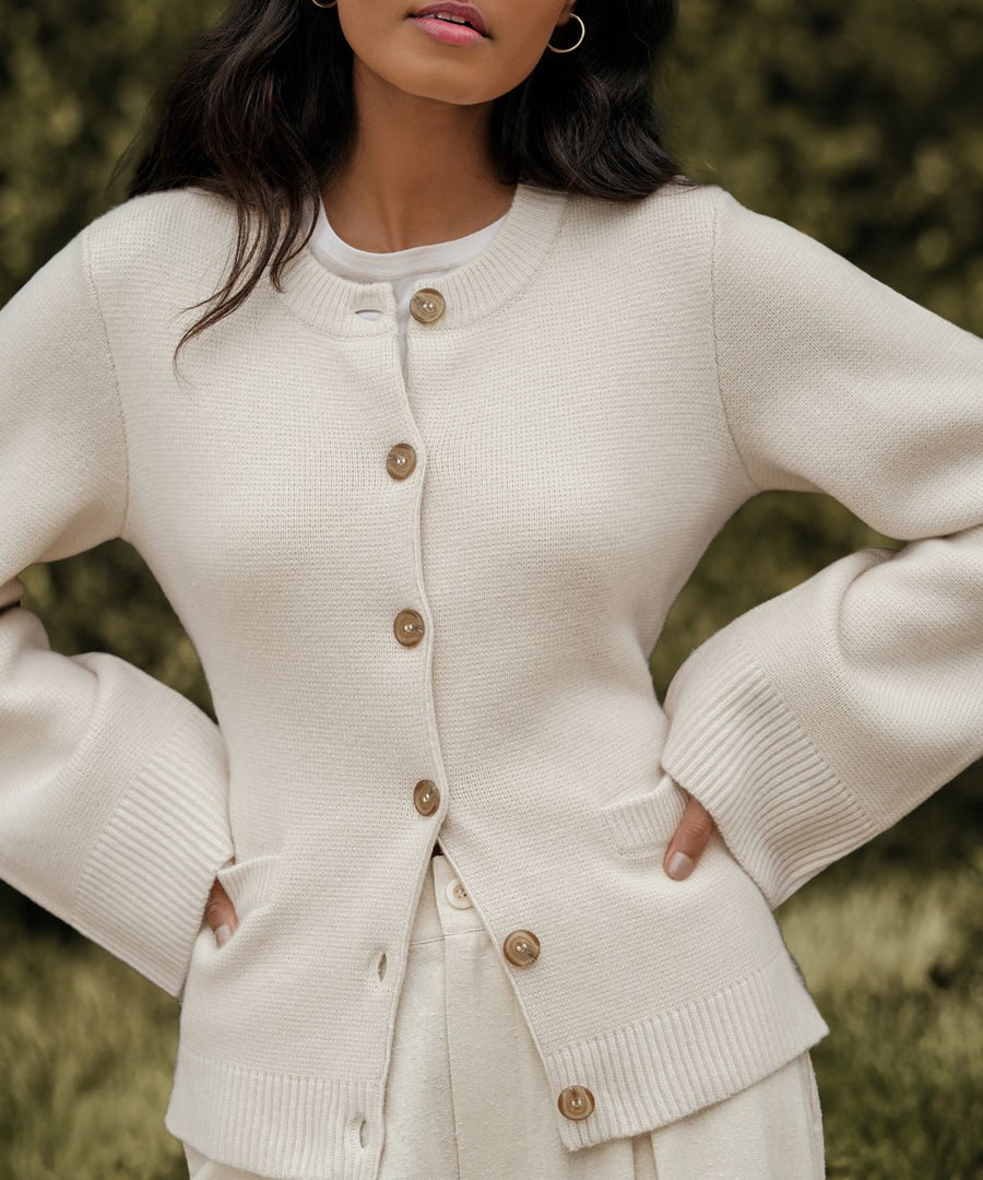 Ivory cardigan button and knit detail