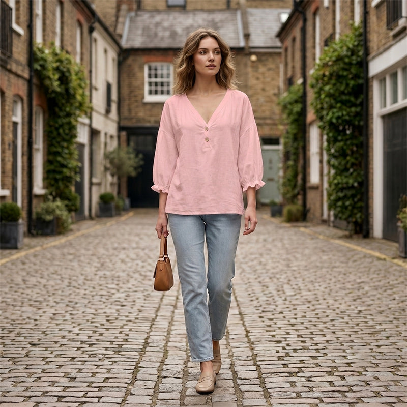 Pink relaxed V-neck blouse outfit